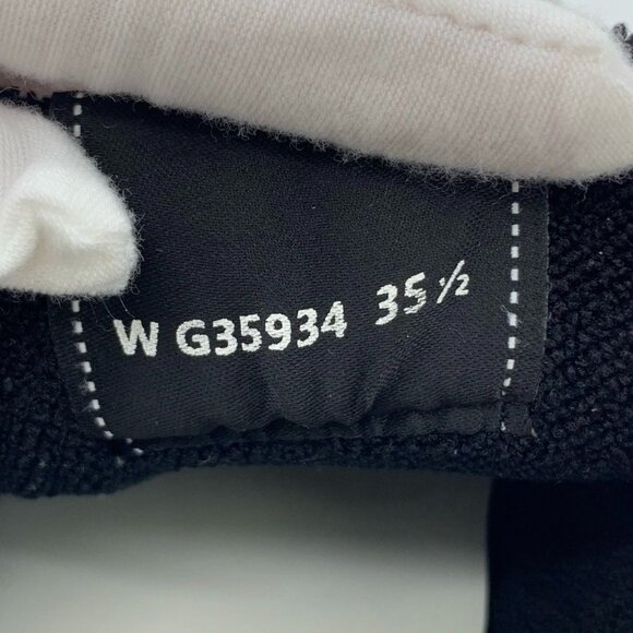 Chanel White Leather Low-Top Sneakers With Black Accents & Logo Detailing - Picture 8 of 8